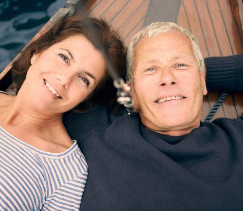 Middle,Aged,Couple,On,Boat,(portrait)